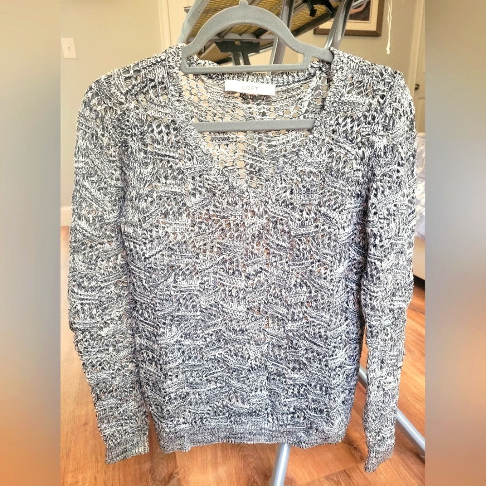 Black and white V-neck sweater